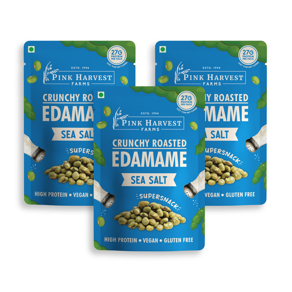 Three packages of Pink Harvest Farms Crunchy Roasted Edamame Sea Salt on a white background